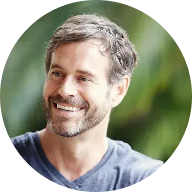 A smiling woman with short brown hair